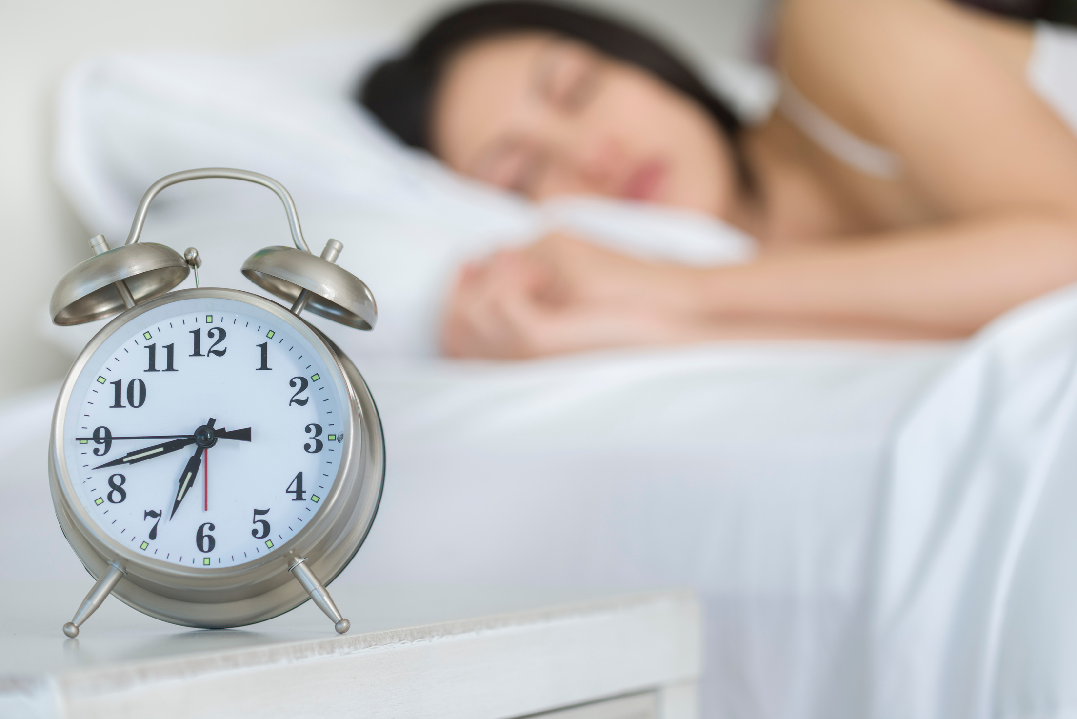 Sleeping Woman and Alarm Clock